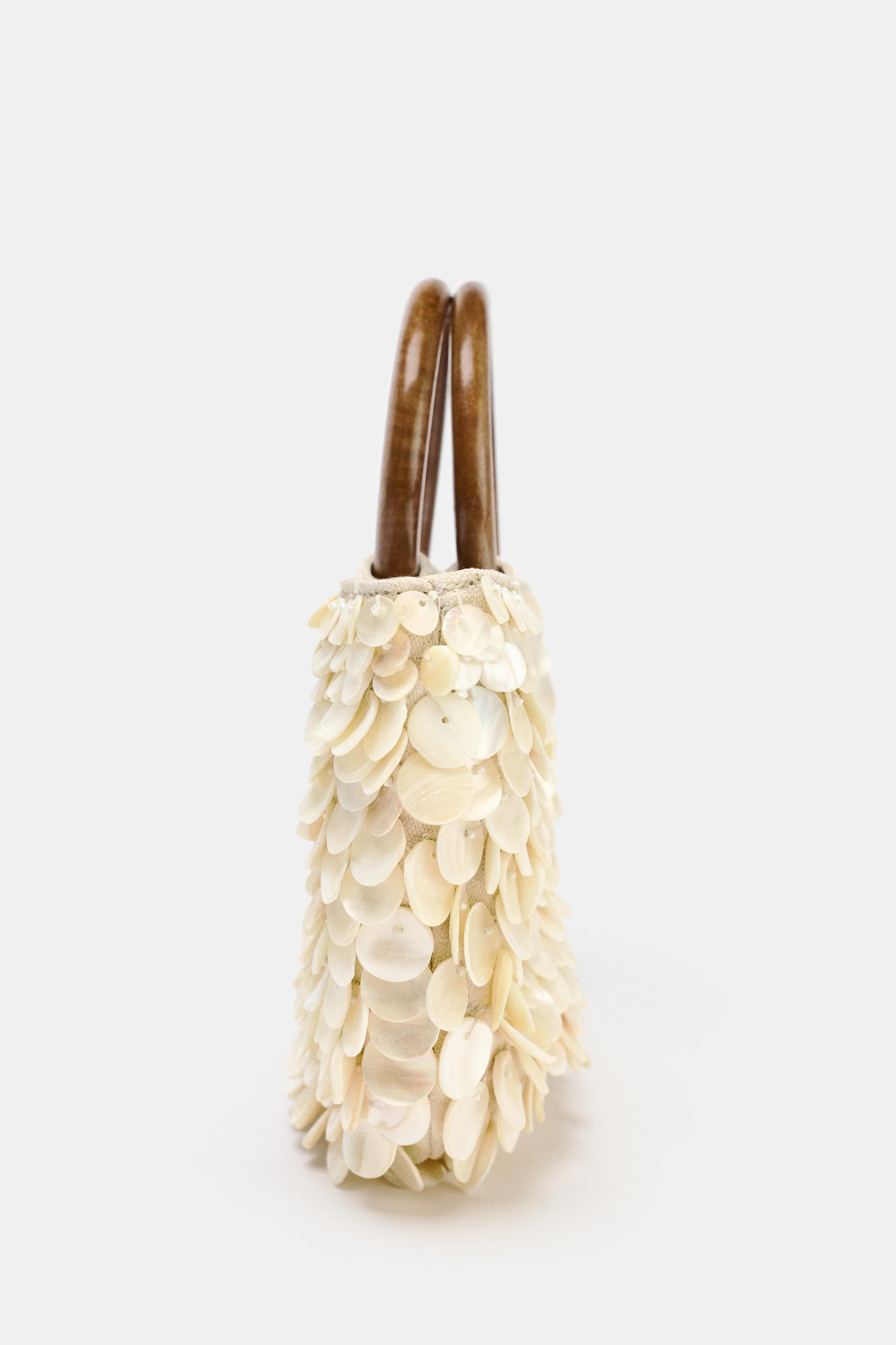 BUCKET BAG WITH APPLIQUÉS